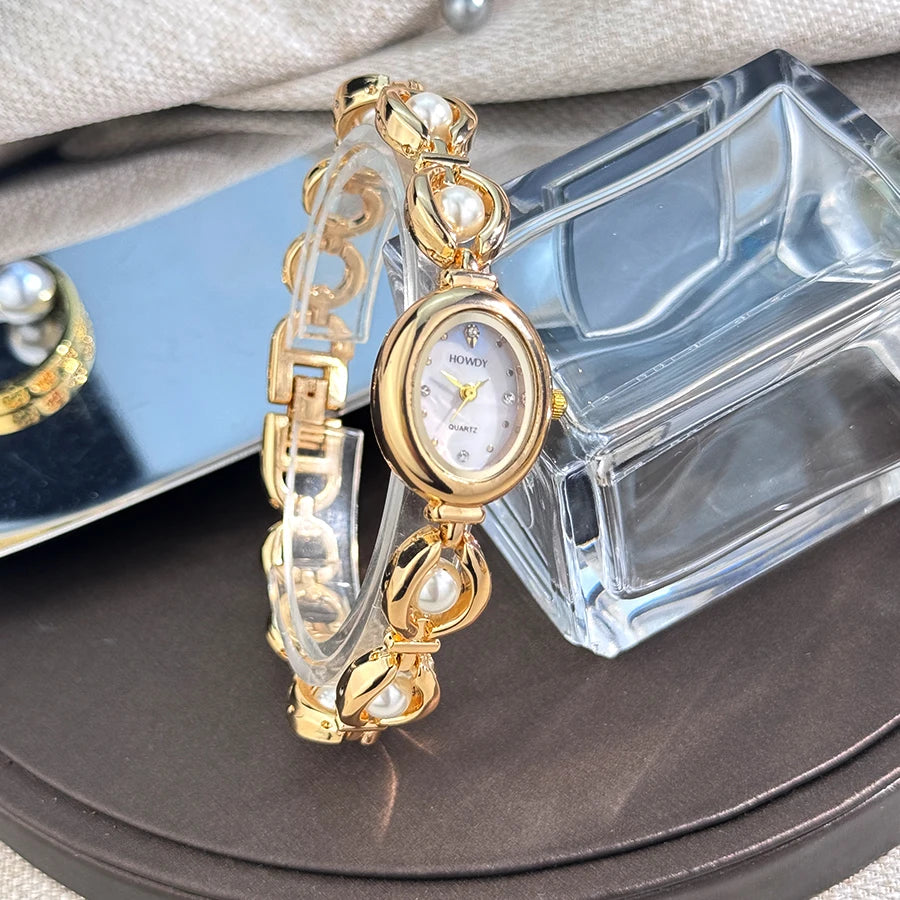 Nouvelle mode de luxe Imitation perle français romantique ovale forme dames Bracelet montre haute esthétique montre à Quartz