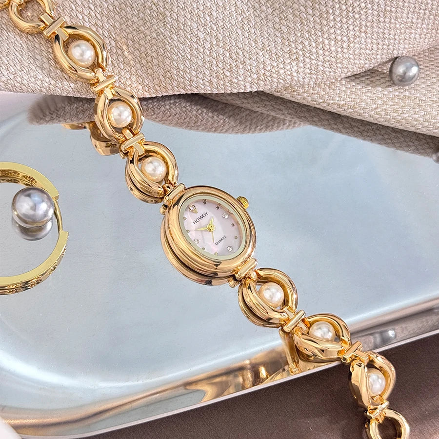 Nouvelle mode de luxe Imitation perle français romantique ovale forme dames Bracelet montre haute esthétique montre à Quartz
