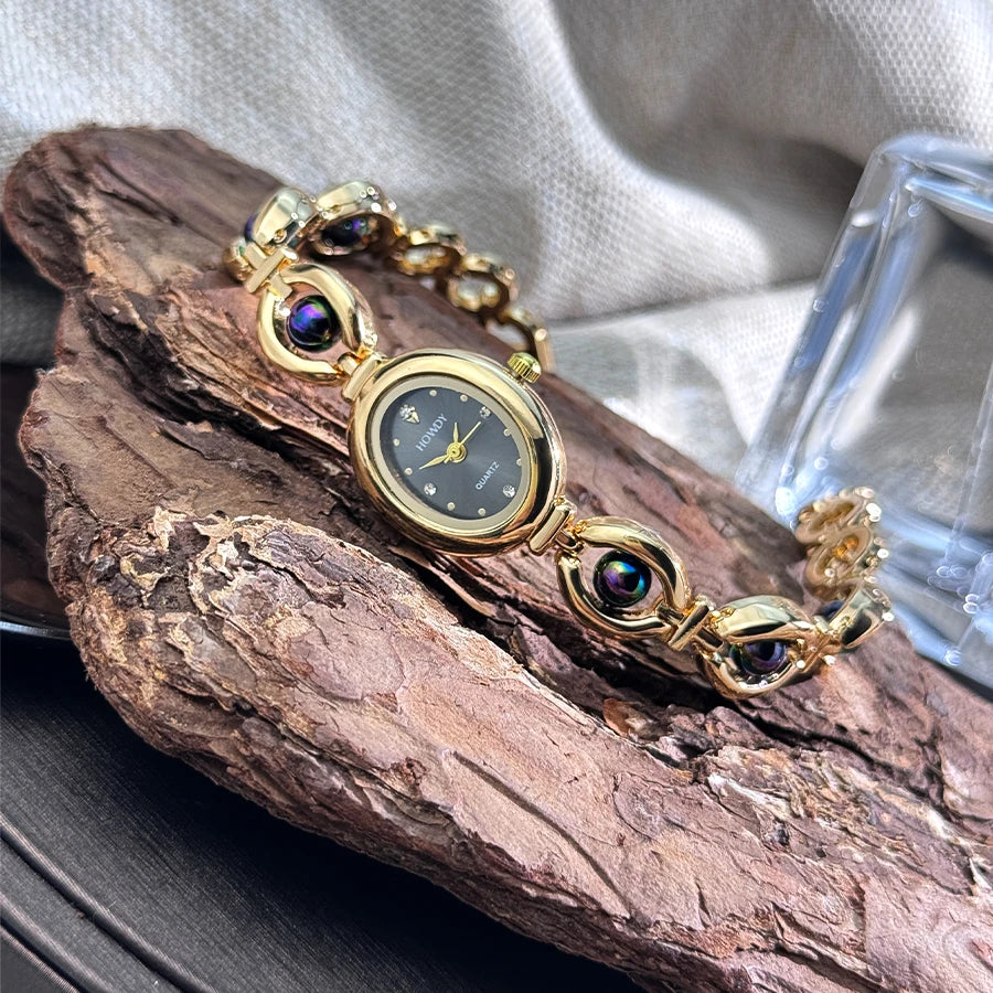 Nouvelle mode de luxe Imitation perle français romantique ovale forme dames Bracelet montre haute esthétique montre à Quartz