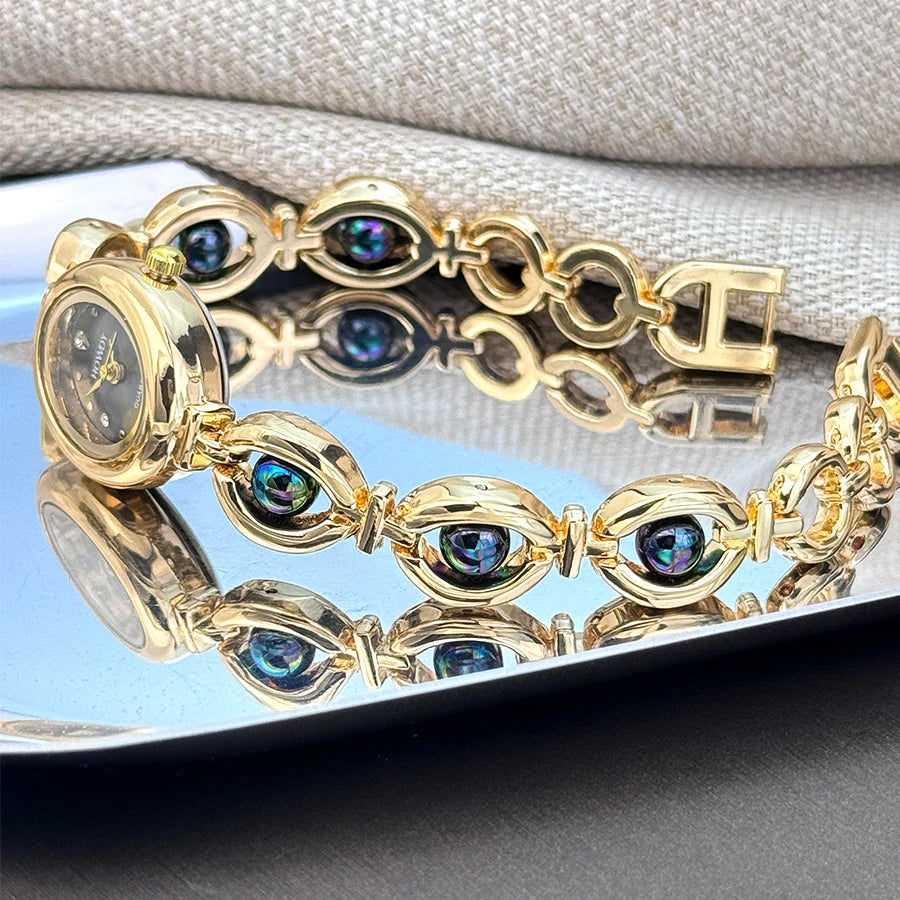 Nouvelle mode de luxe Imitation perle français romantique ovale forme dames Bracelet montre haute esthétique montre à Quartz