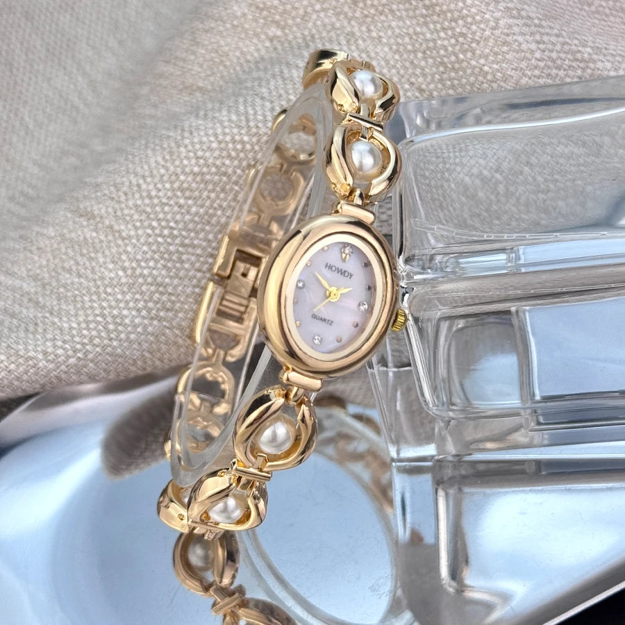 Nouvelle mode de luxe Imitation perle français romantique ovale forme dames Bracelet montre haute esthétique montre à Quartz