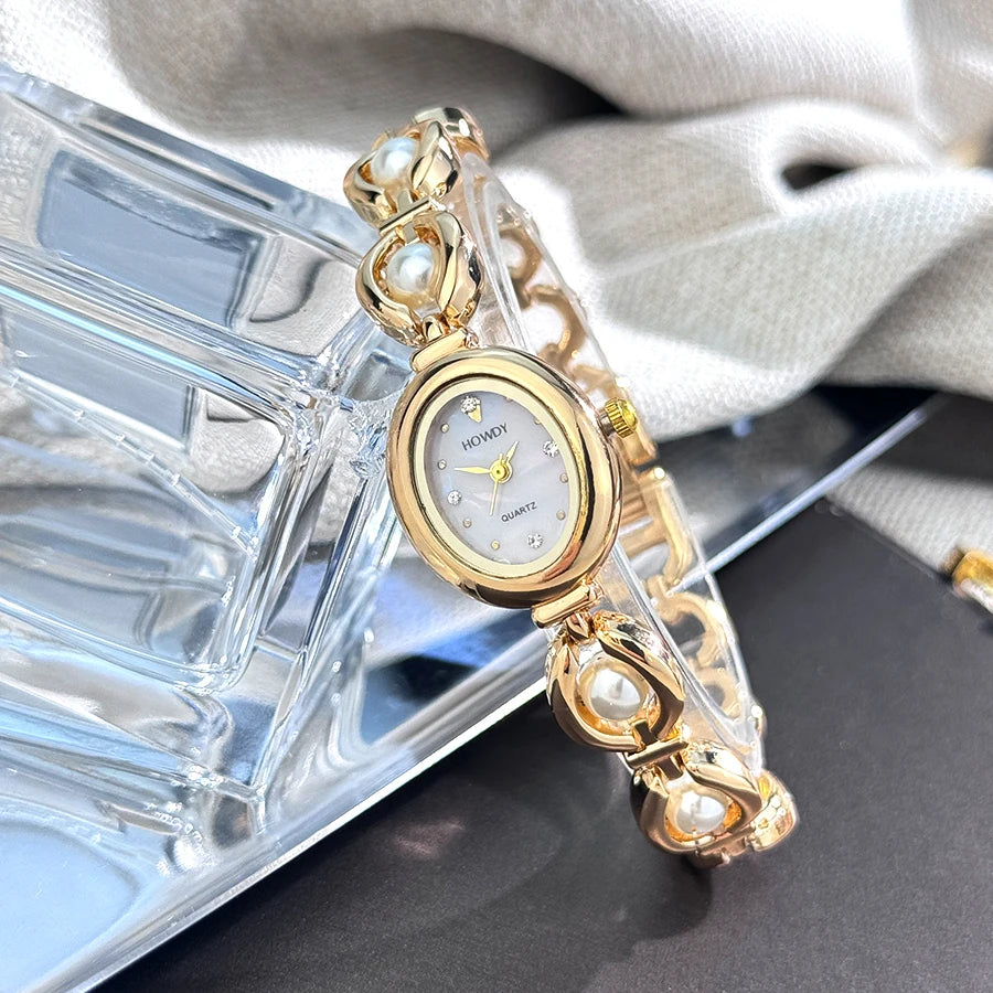 Nouvelle mode de luxe Imitation perle français romantique ovale forme dames Bracelet montre haute esthétique montre à Quartz