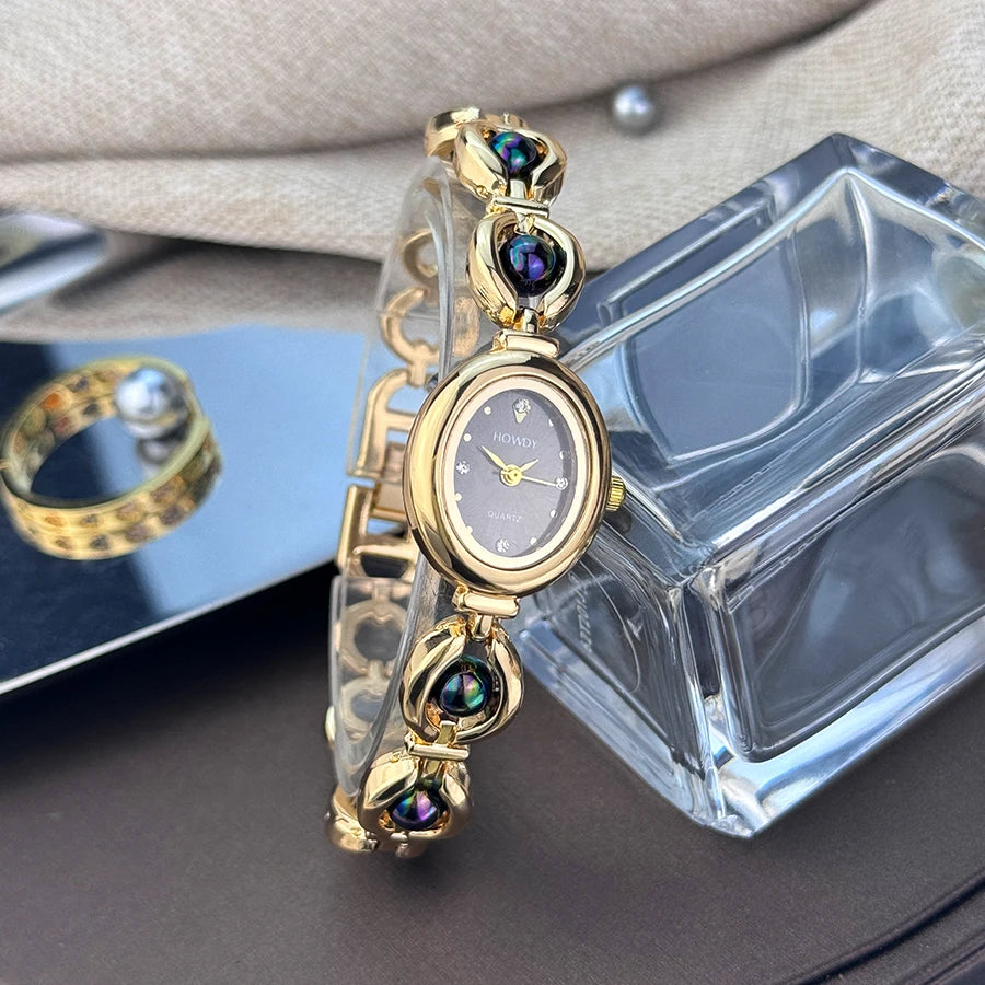 Nouvelle mode de luxe Imitation perle français romantique ovale forme dames Bracelet montre haute esthétique montre à Quartz