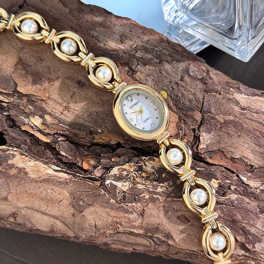 Nouvelle mode de luxe Imitation perle français romantique ovale forme dames Bracelet montre haute esthétique montre à Quartz