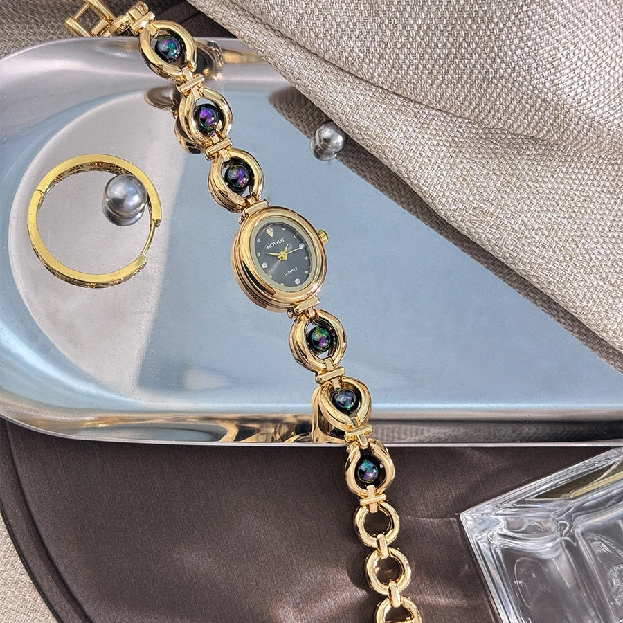 Nouvelle mode de luxe Imitation perle français romantique ovale forme dames Bracelet montre haute esthétique montre à Quartz